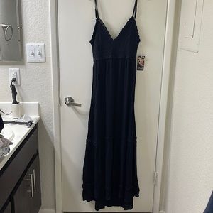 Black knitted backless ruffled maxi dress